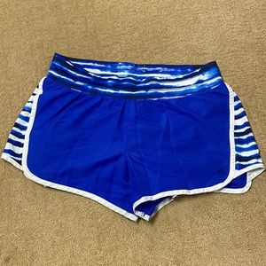 Blue athletic shorts with liner